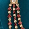 Detail of the three kundan-style and ruby-toned strands with square side stone and pearl-look bead cluster