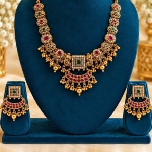 opulence-design10-main-600x900 Ruby-red temple necklace set with crescent pendant and earrings