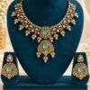 Mint kundan necklace with mint-toned centre stones and matching earrings