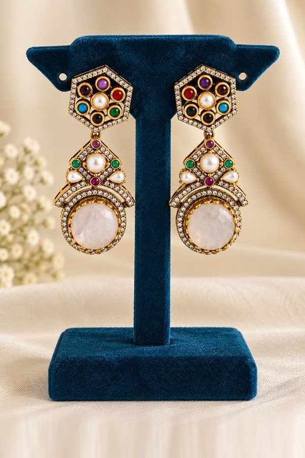 Pair of navratna earrings with hexagon studs and large rose-white stones