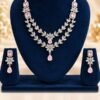 opulence-design14-main-600x900 Blush pink American diamond two-layer necklace and matching drop earrings on a navy velvet stand