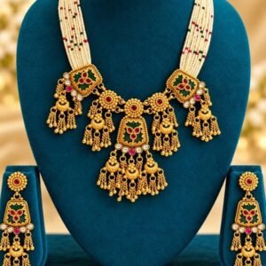 opulence-design3-main-600x900 Green meenakari multi-strand necklace with pearl-look beads, gold-tone tassels and matching earrings