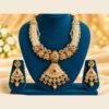 opulence-design5-1-600x900 Ivory meena necklace with pearl-look and mint bead strands and matching earrings on a teal stand