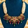 opulence-design6-1-600x900 Pearl-look multi-strand choker on a navy velvet stand, alternate view
