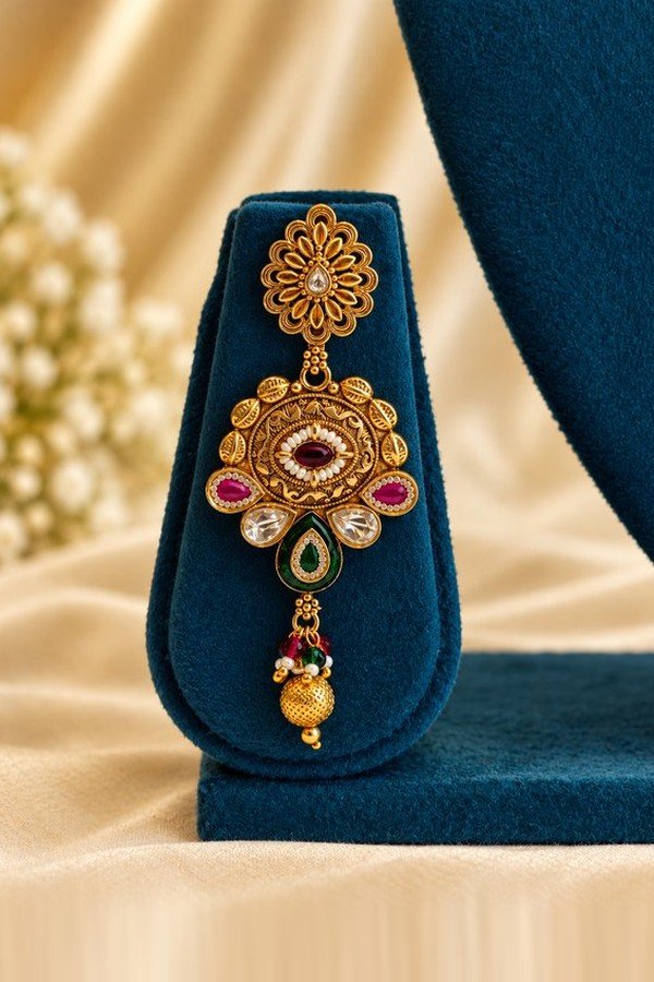 opulence-design7-main-600x900 One antique floral earring with engraved medallion, pearl-look ring and textured bead drop