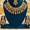 Pastel stone necklace set with maang tikka and earrings